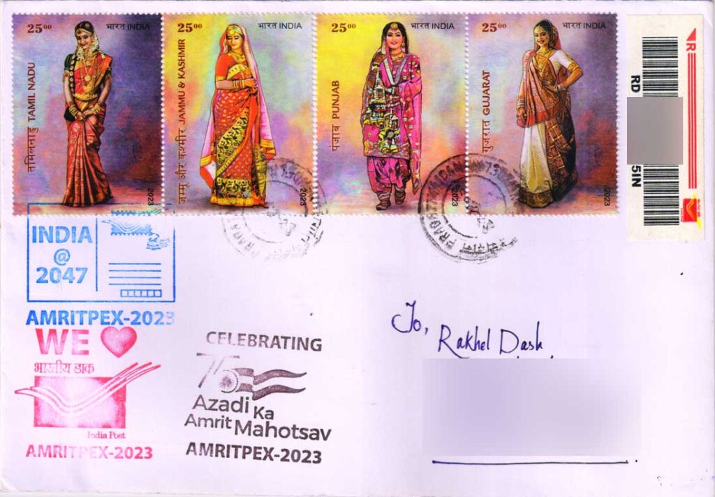 A used cover with stamps released on bridal costumes of India during AMRITPEX